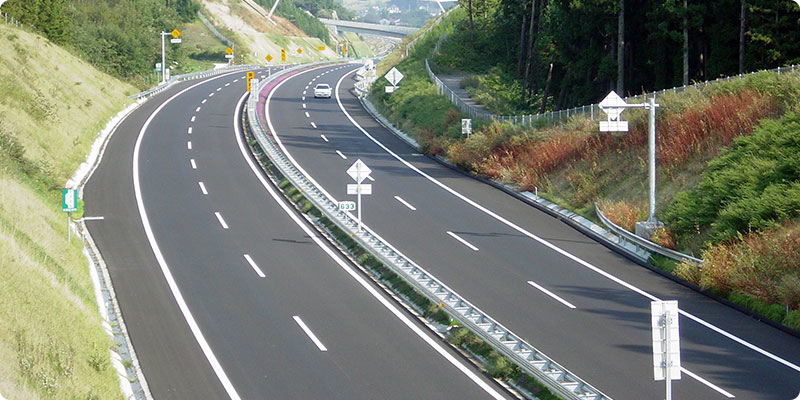 A road with Pamco Crustone material for roadbeds